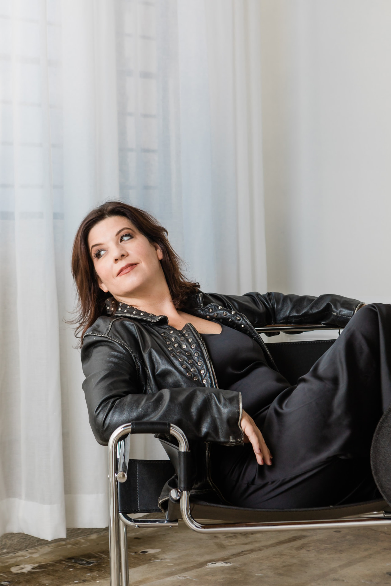 Portrait of Cynthia Ferngren in a black leather jacket